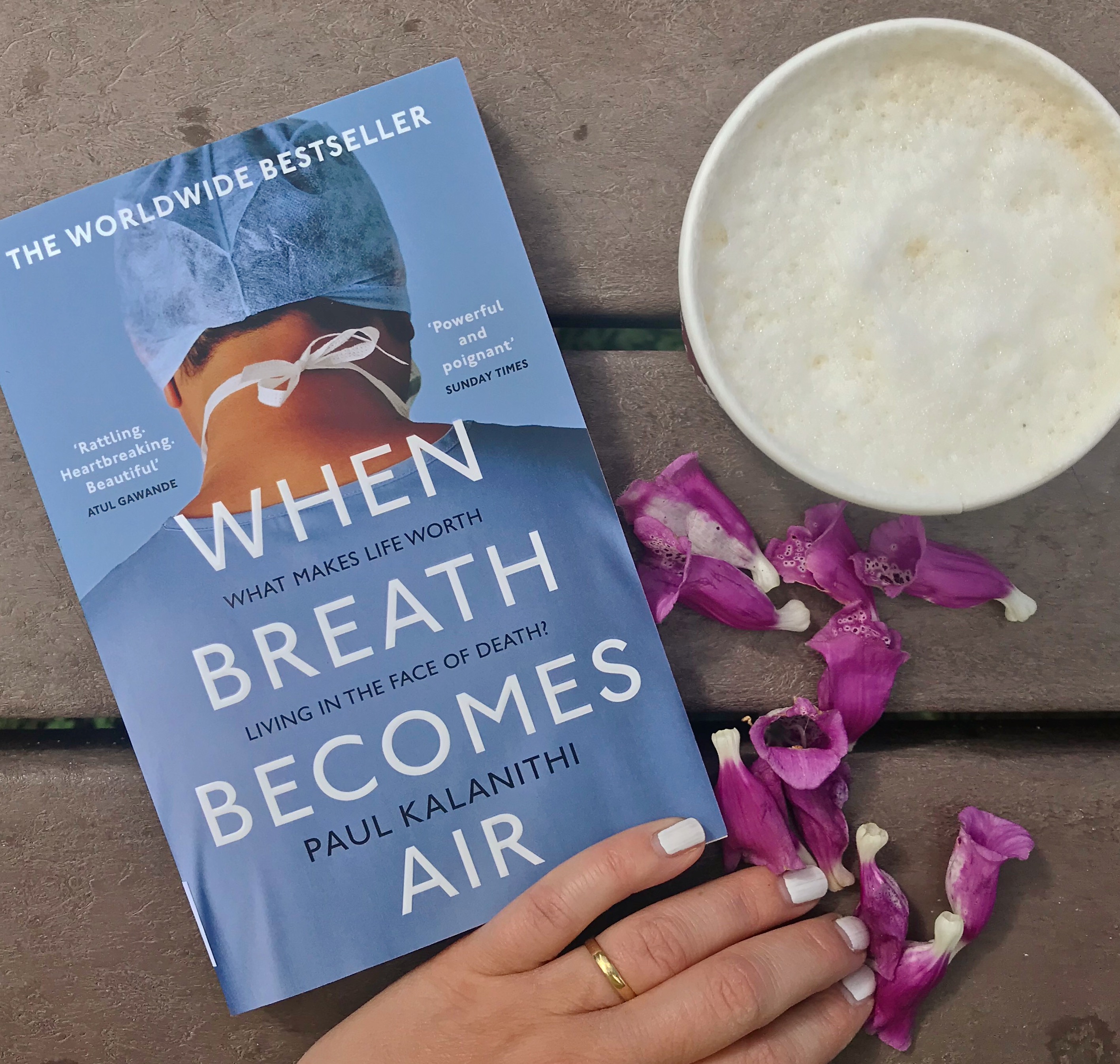 Picture of 'When Breath Becomes Air' book with coffee on table