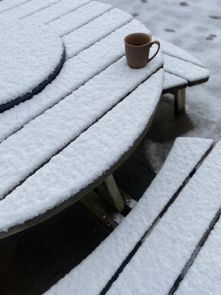 Snow in April - coffee on table