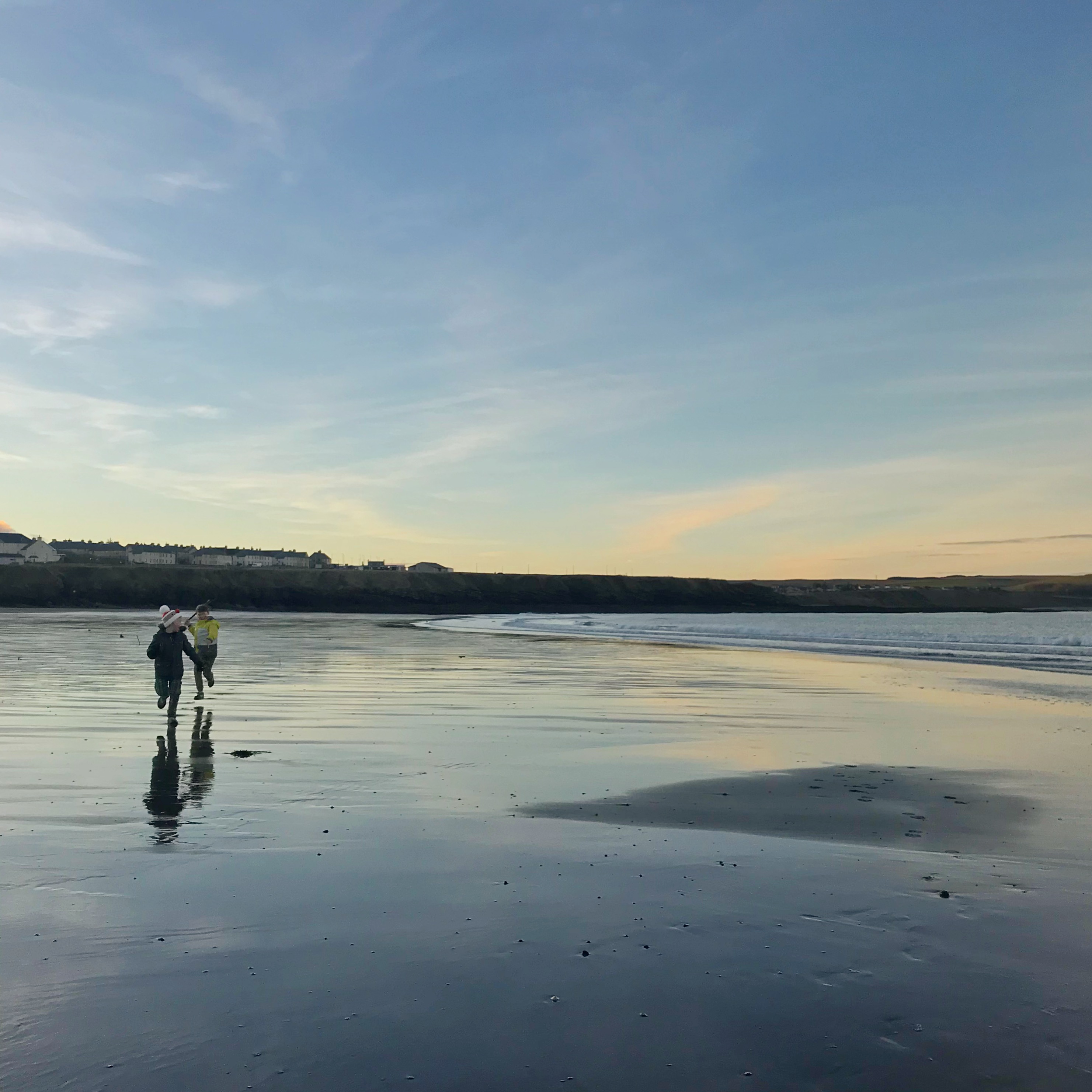 Beach Scene with boys running