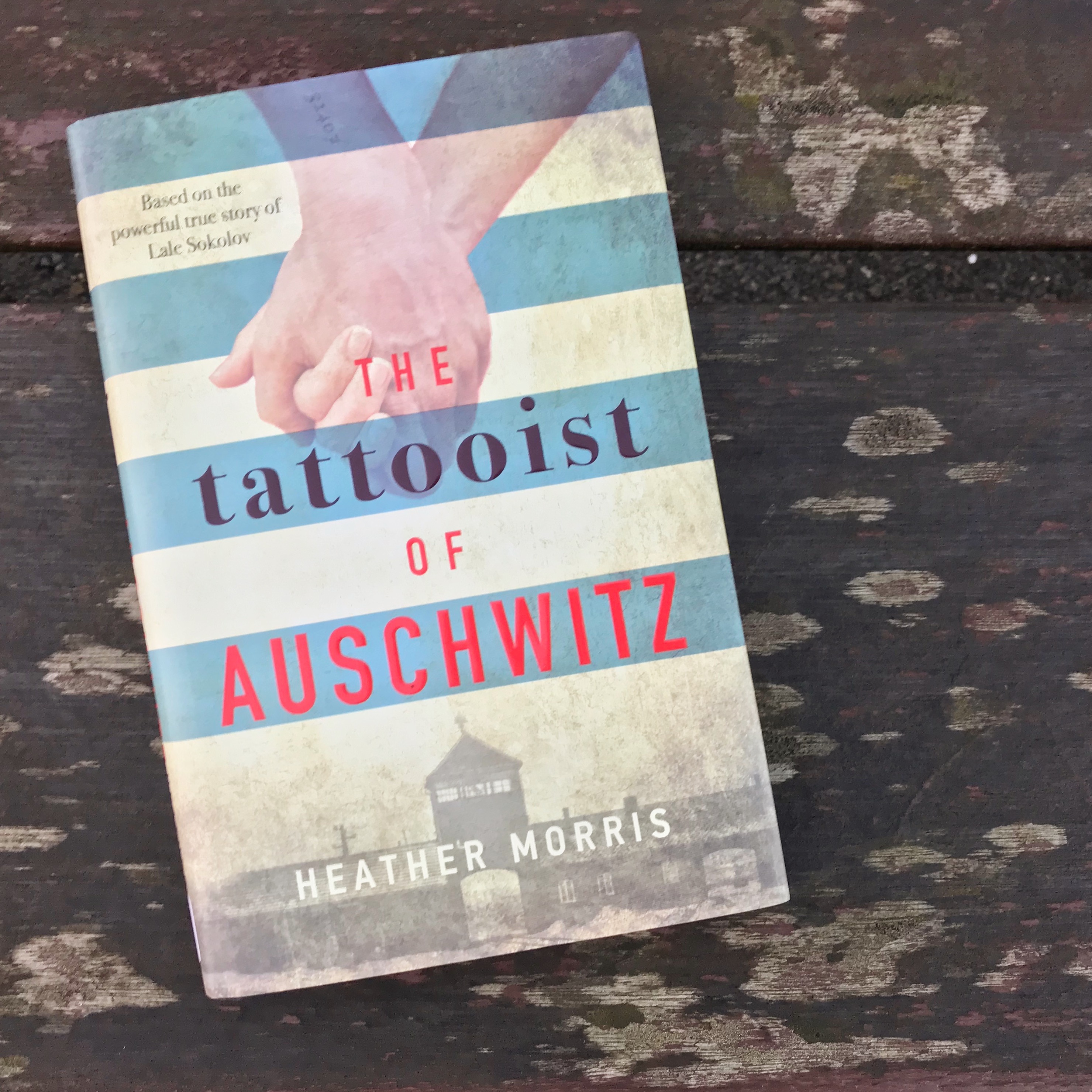 Picture of 'The Tattooist of Auschwitz' book on table
