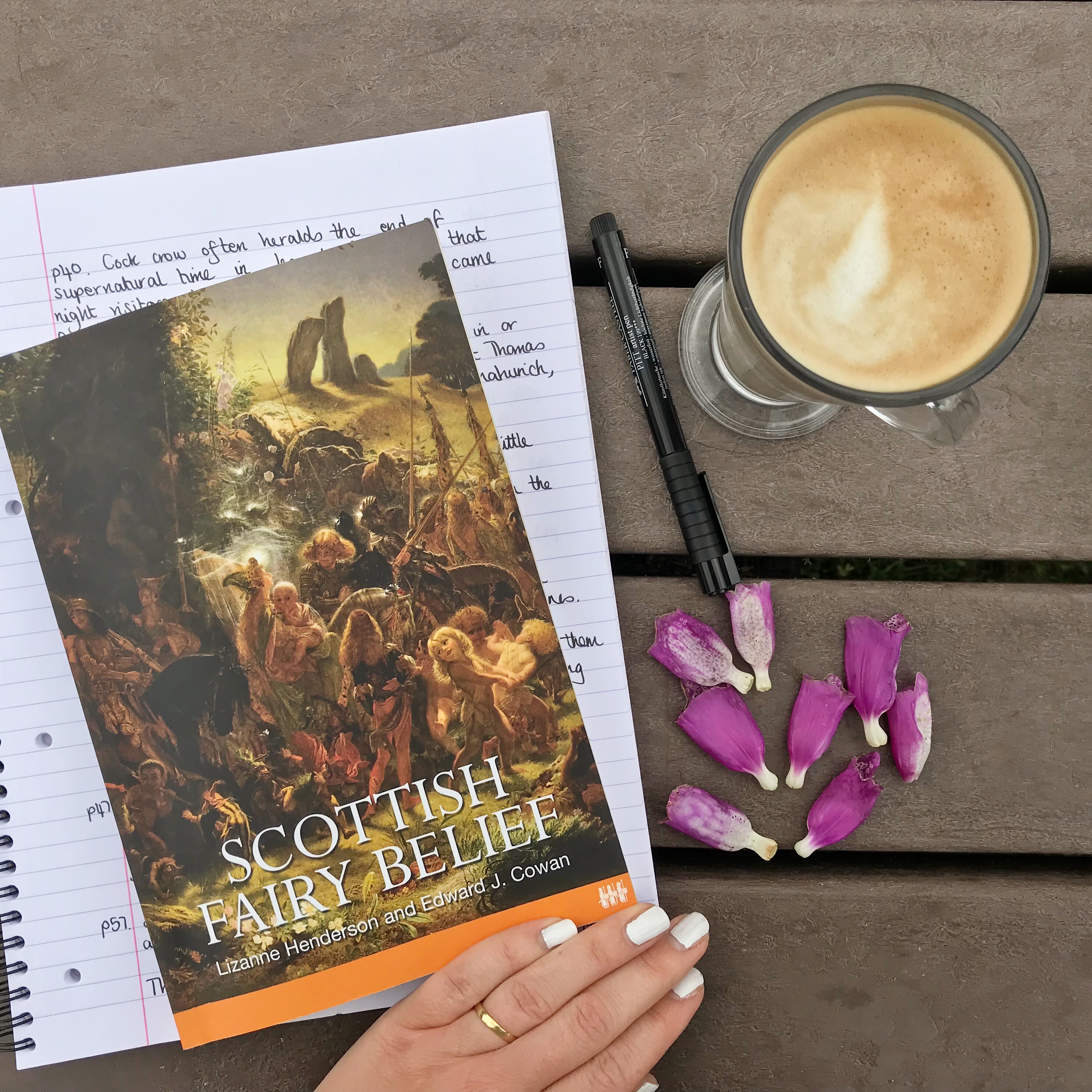 Picture of book on Scottish Fairy Belief, notes and coffee