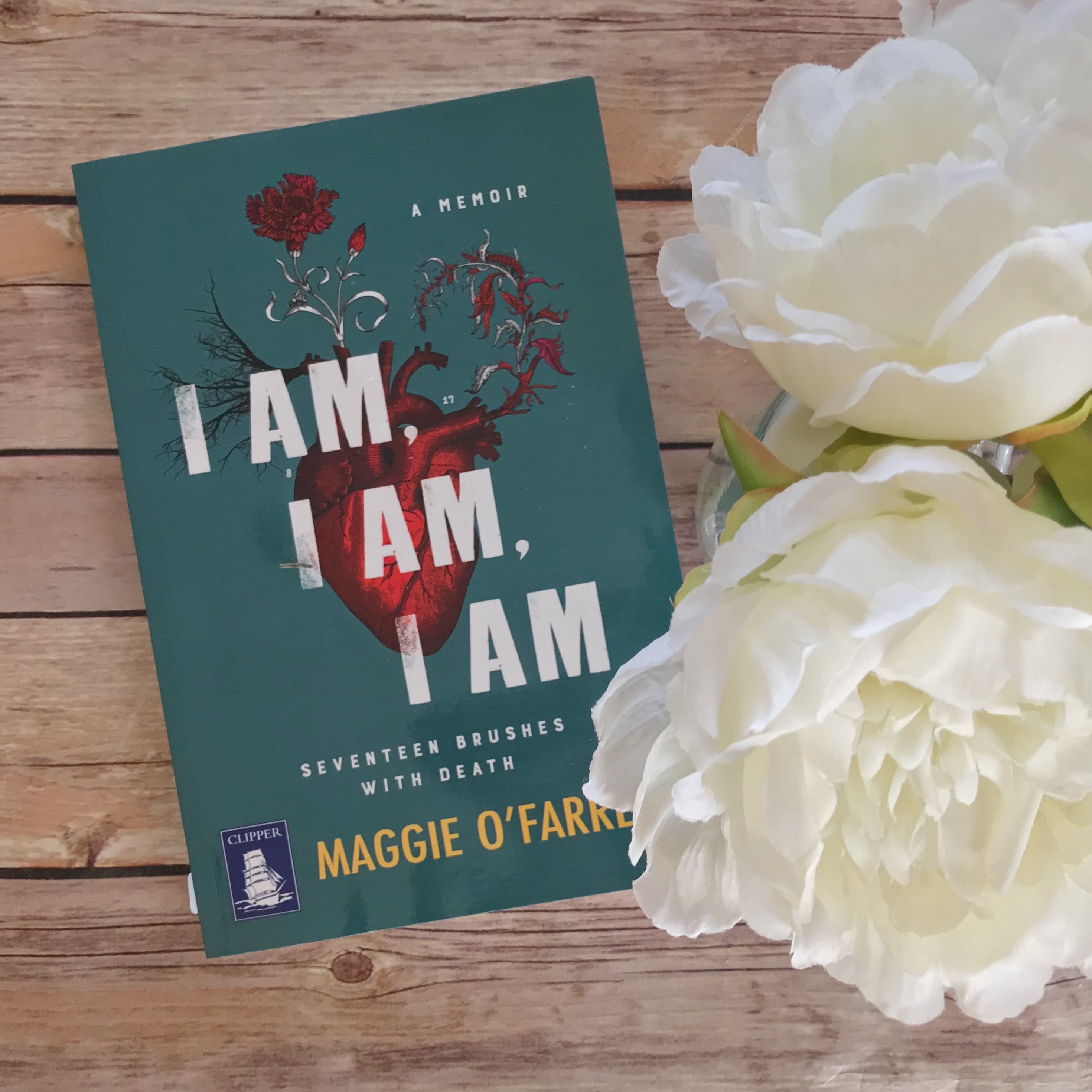 Picture of 'I Am, I Am, I Am' book with flowers