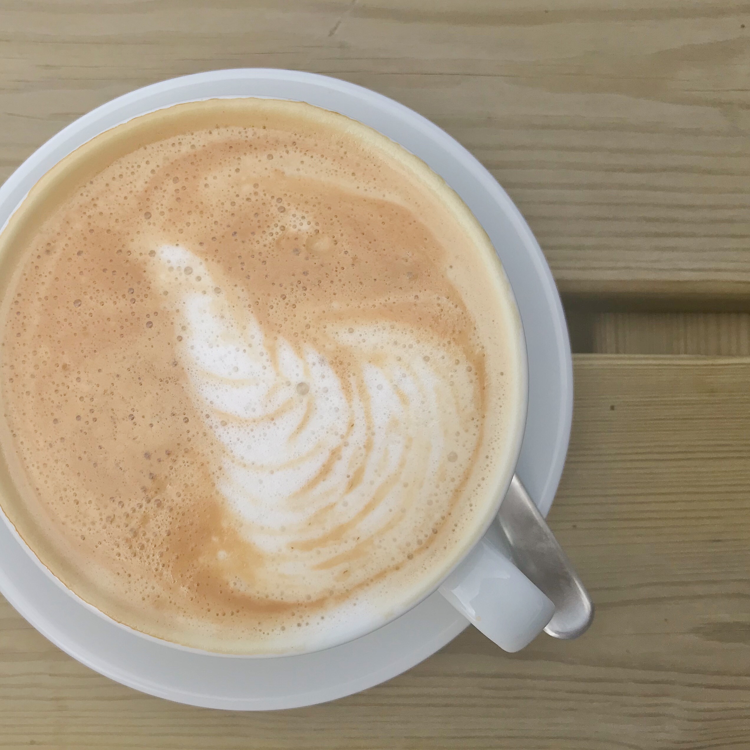 Picture of almond latte on table