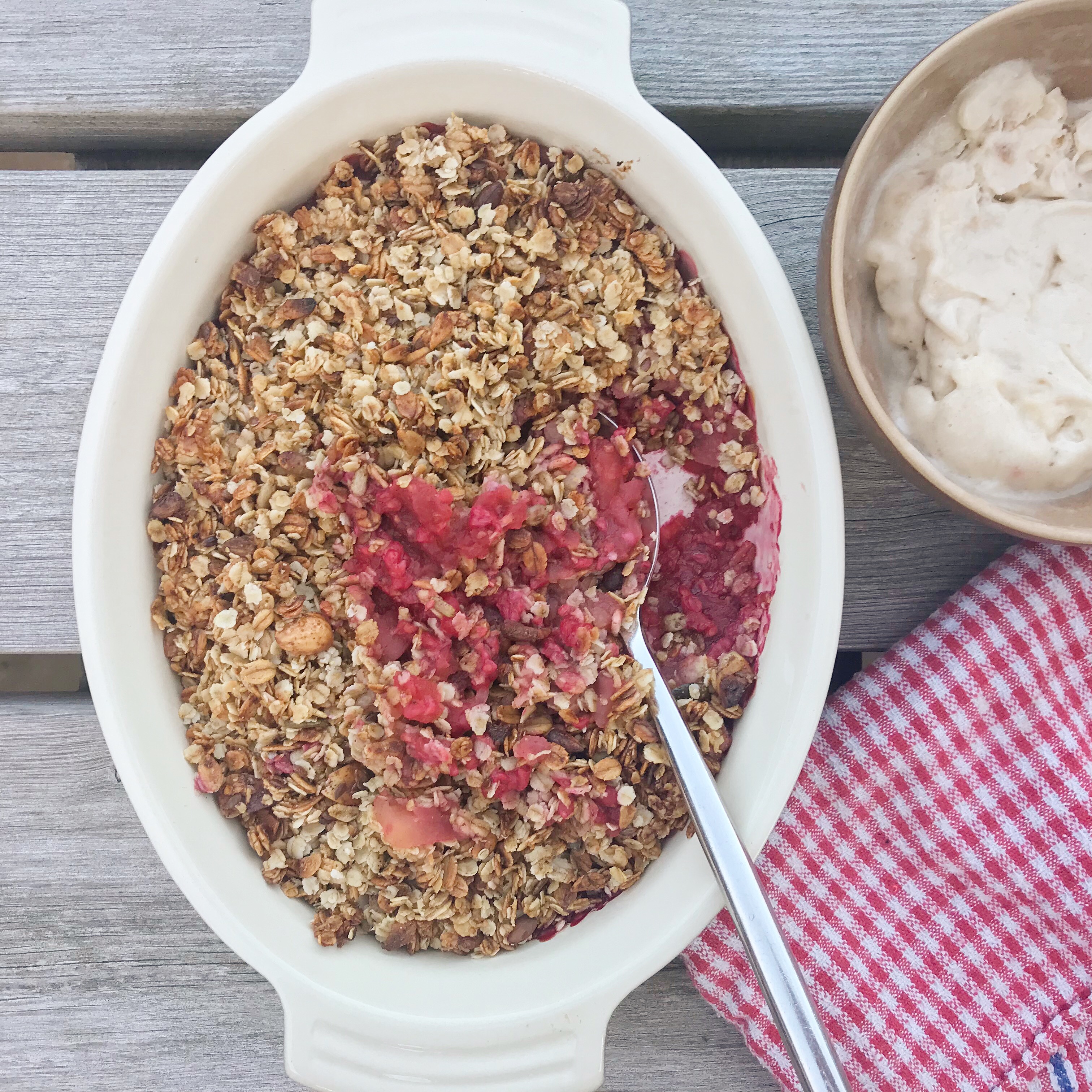 Picture of apple and berry crumble on table