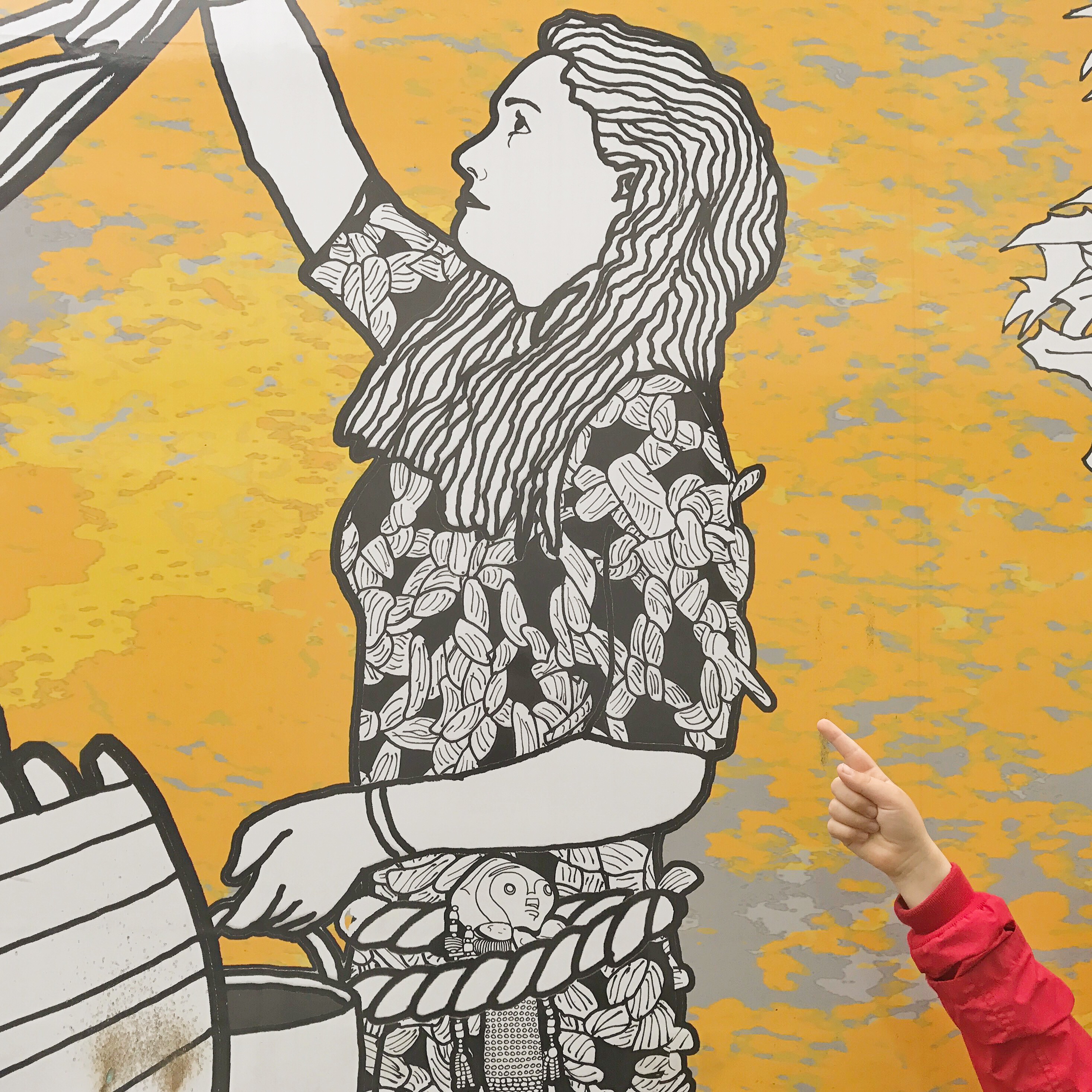 Picture of street art with lady painting